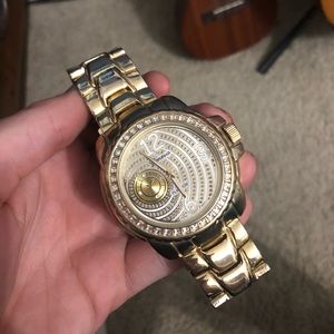 Gold and cubix watch